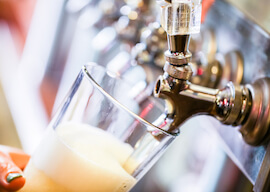 waitress pouring beer