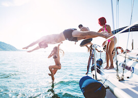 group of bucks jumping off party boat