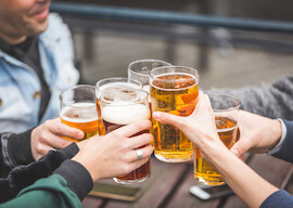 group of bucks cheering beers