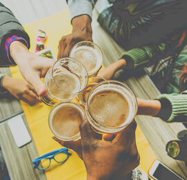 group of bucks cheers beers at the brewery