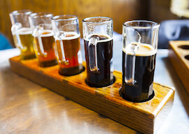 4 different types of craft beers on a table