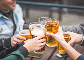 group of bucks cheering beers