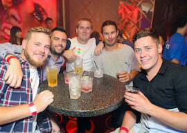 group of bucks on a pub crawl having a beverage