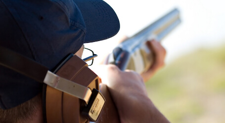 buck clay shooting with shotgun