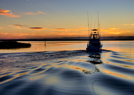 fishing boat leaving the harbour