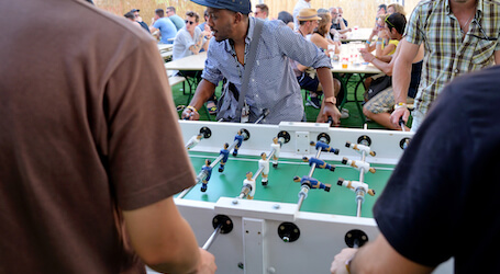 bucks playing on foosball table