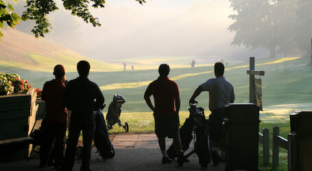 group of stags waiting to tee off