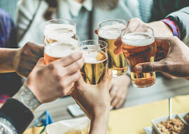 group of bucks cheering beers