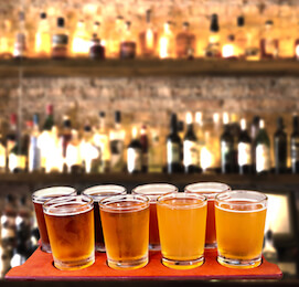 bunch of craft beers on a table