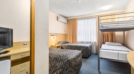 interior apartment view bunk beds and two singles bucks accommodation hobart