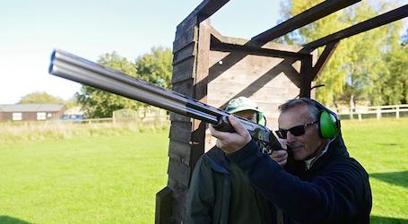 group of bucks shooting clay gun