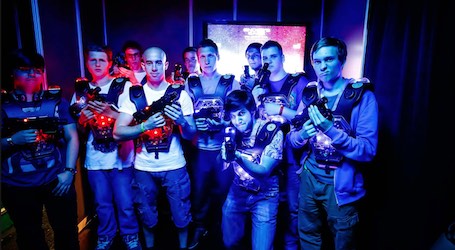 group of bucks playing laser skirmish