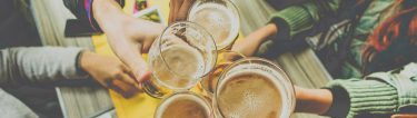 group of bucks cheers beers