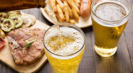 beer and dinner on a table