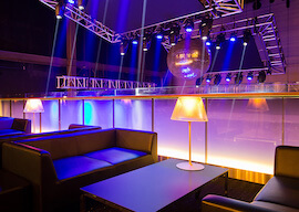 private nightclub booth overlooking the dance floor
