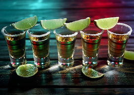 tequila shots with salt and limes