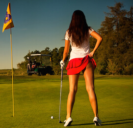 sexy golf bunny in red skirt with golf club