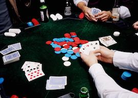 group of bucks playing poker and drinking