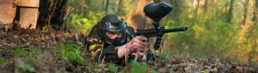 bucks lying down on the paintball field