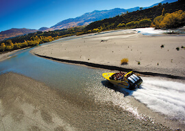 group of bucks riding jet boat