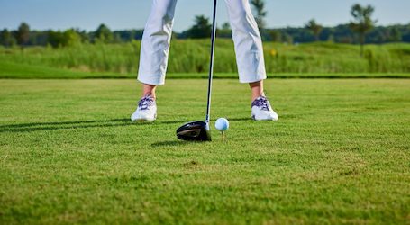 buck playing golf