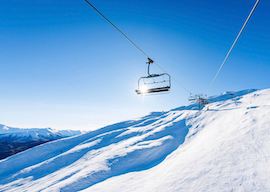 ski lift and snowy mountains in queenstown