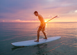 buck stand up paddle boarding in cairns