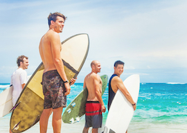 group of bucks surfing in byron bay