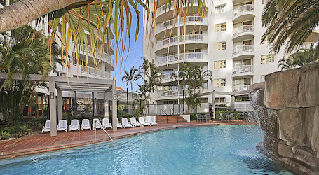 pool and sun chairs in surfers paradise apartment