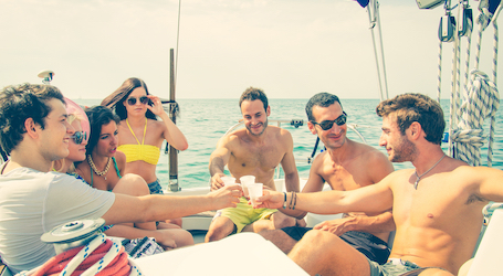 group of bucks having a drink on a private boat charter