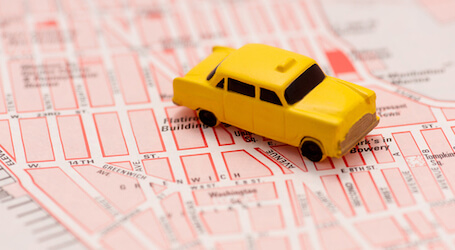 yellow cab on a map