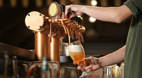 bartender pouring beer