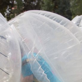 group of bucks playing bubble soccer