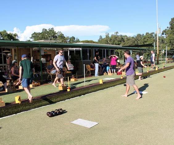 group of bucks playing lawn bowls