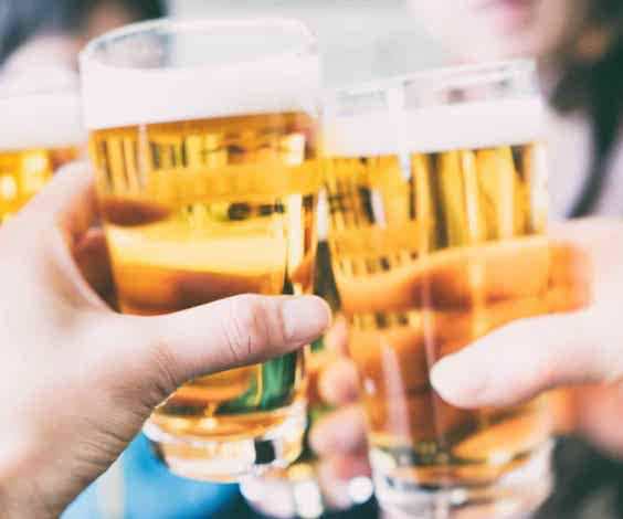 group of bucks cheering beers