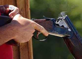 buck shooting clay gun