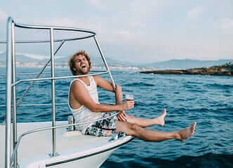 buck drinking beer on sydney luxury boat cruise