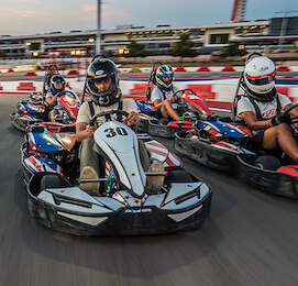 group of bucks racing go-karts