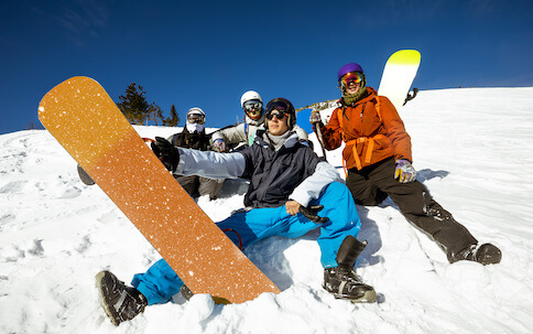 group of bucks snowboarding