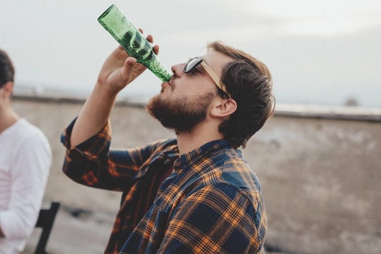 man drinking 