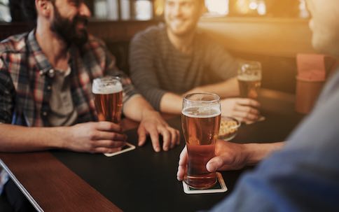 group of bucks drinking beer in taupo bar