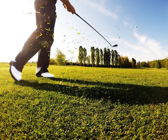 bucks group playing golf