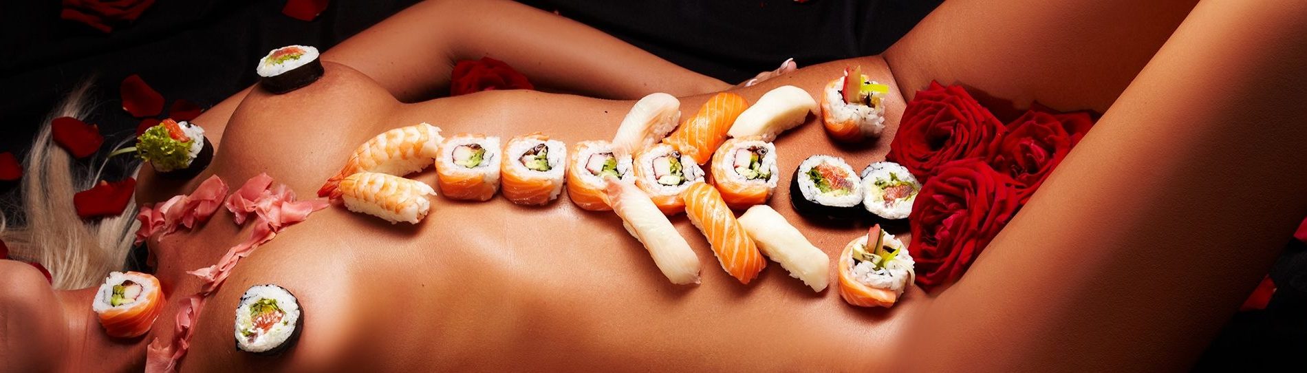 gold coast body sushi on lady lying down